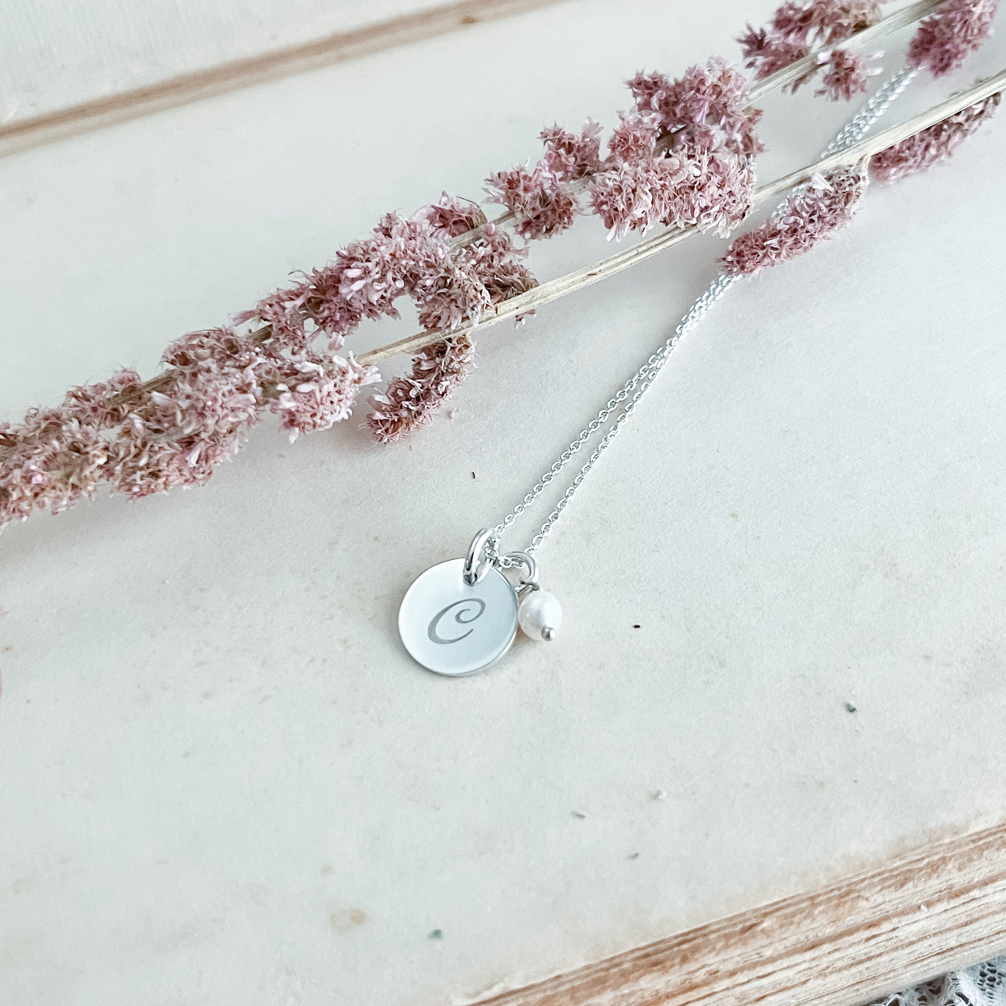 Sterling Silver Monogram Disc Pendant with pearl accent.
