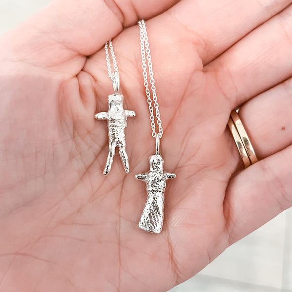 A sterling silver worry doll pendant made by molding and casting an actual Guatemalan worry doll. 