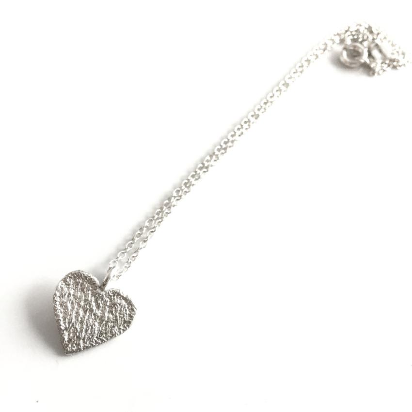 sterling silver cast lace heart pendant